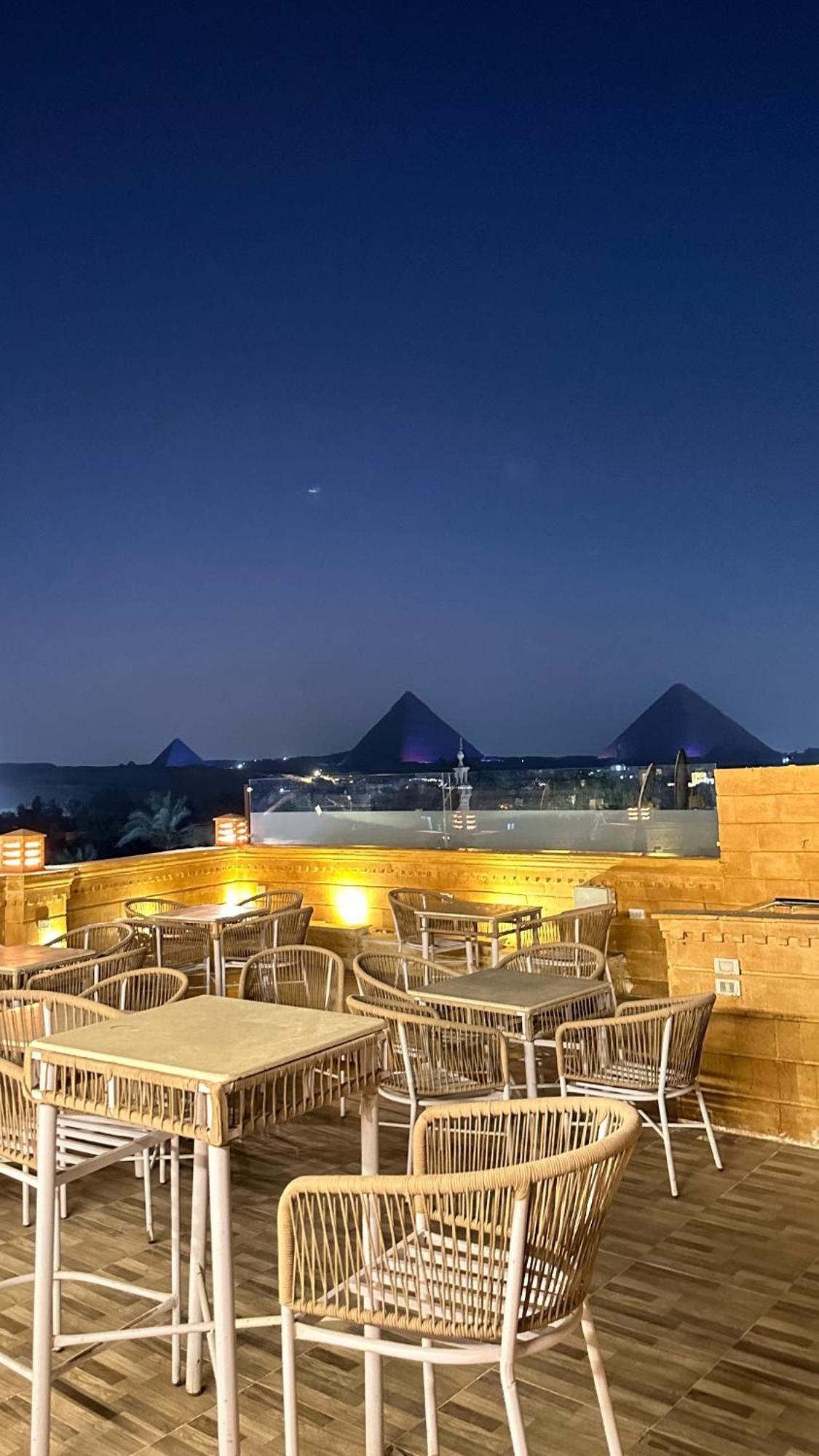 Taj Pyramids View Inn Kafret el-Gabal エクステリア 写真