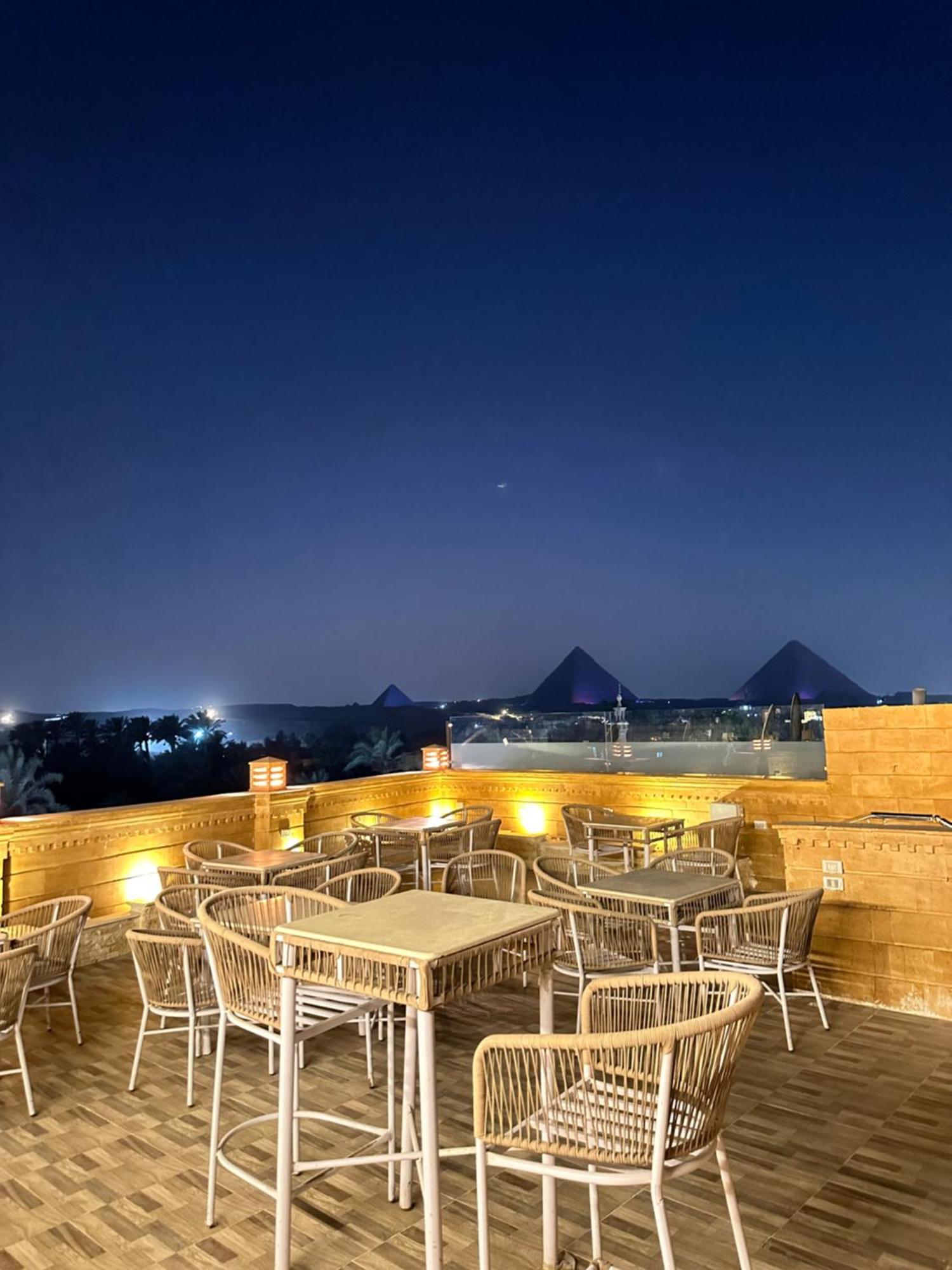 Taj Pyramids View Inn Kafret el-Gabal エクステリア 写真