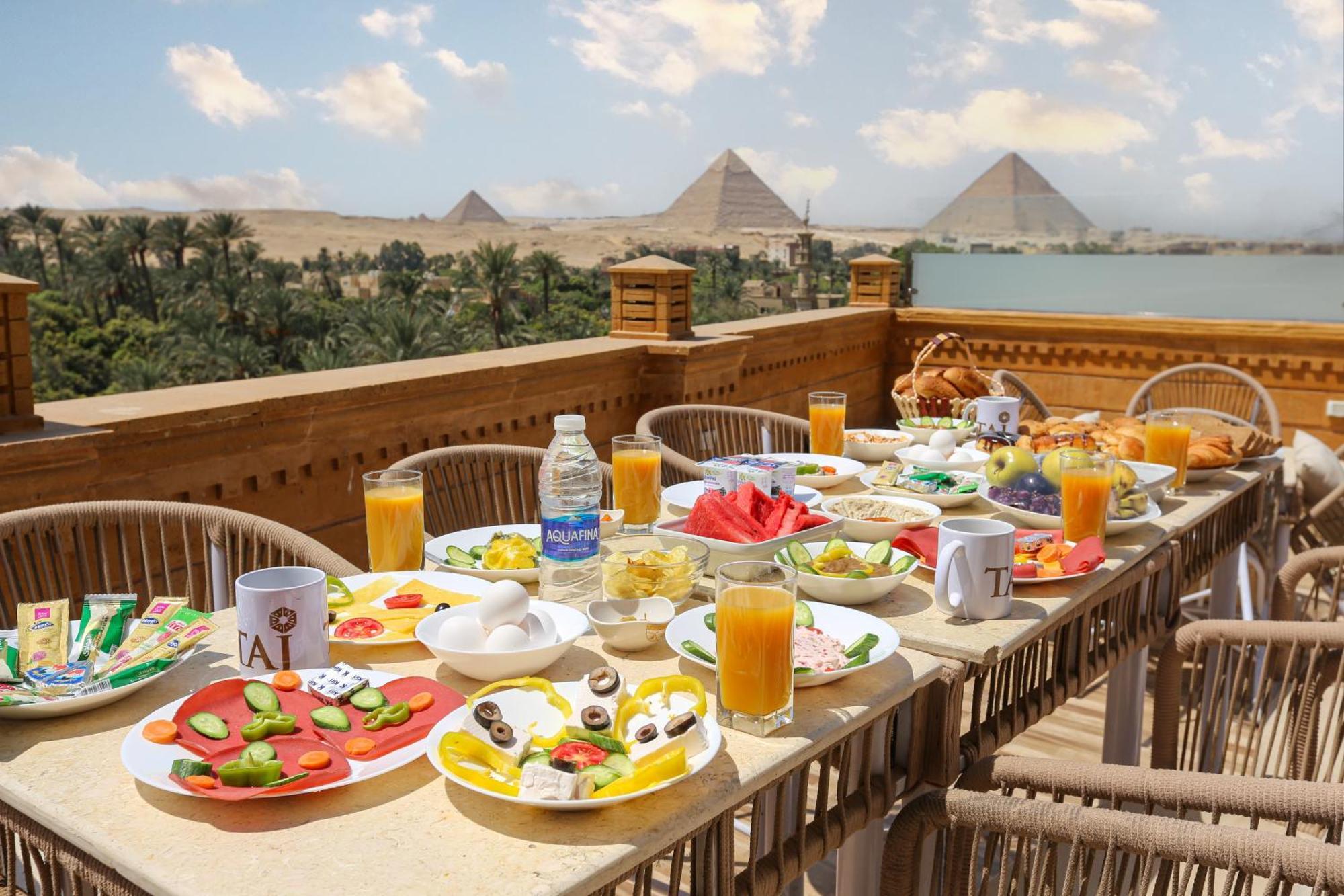 Taj Pyramids View Inn Kafret el-Gabal エクステリア 写真