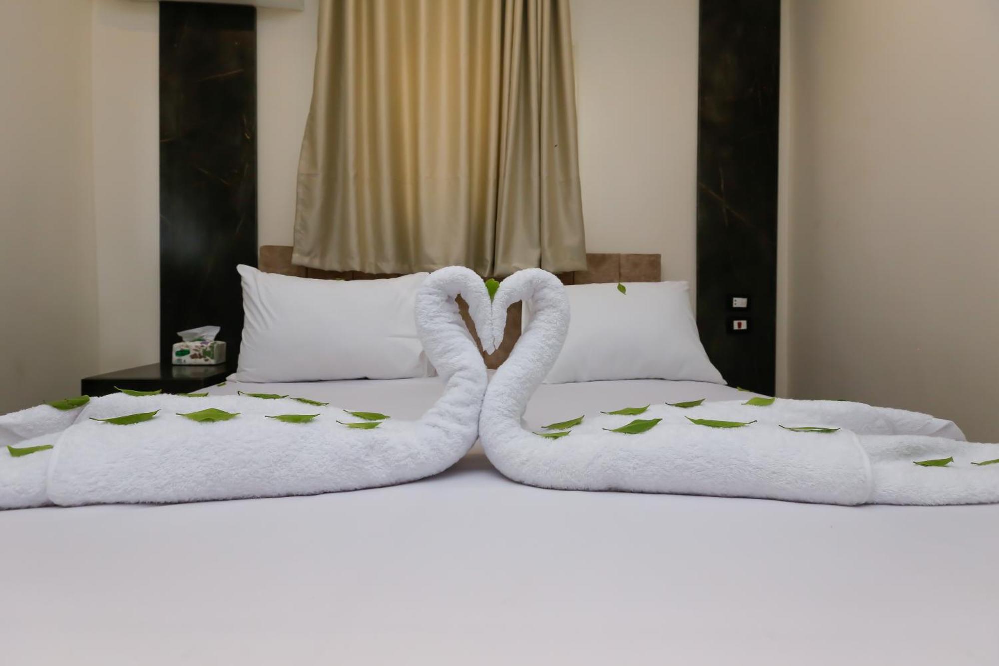 Taj Pyramids View Inn Kafret el-Gabal エクステリア 写真