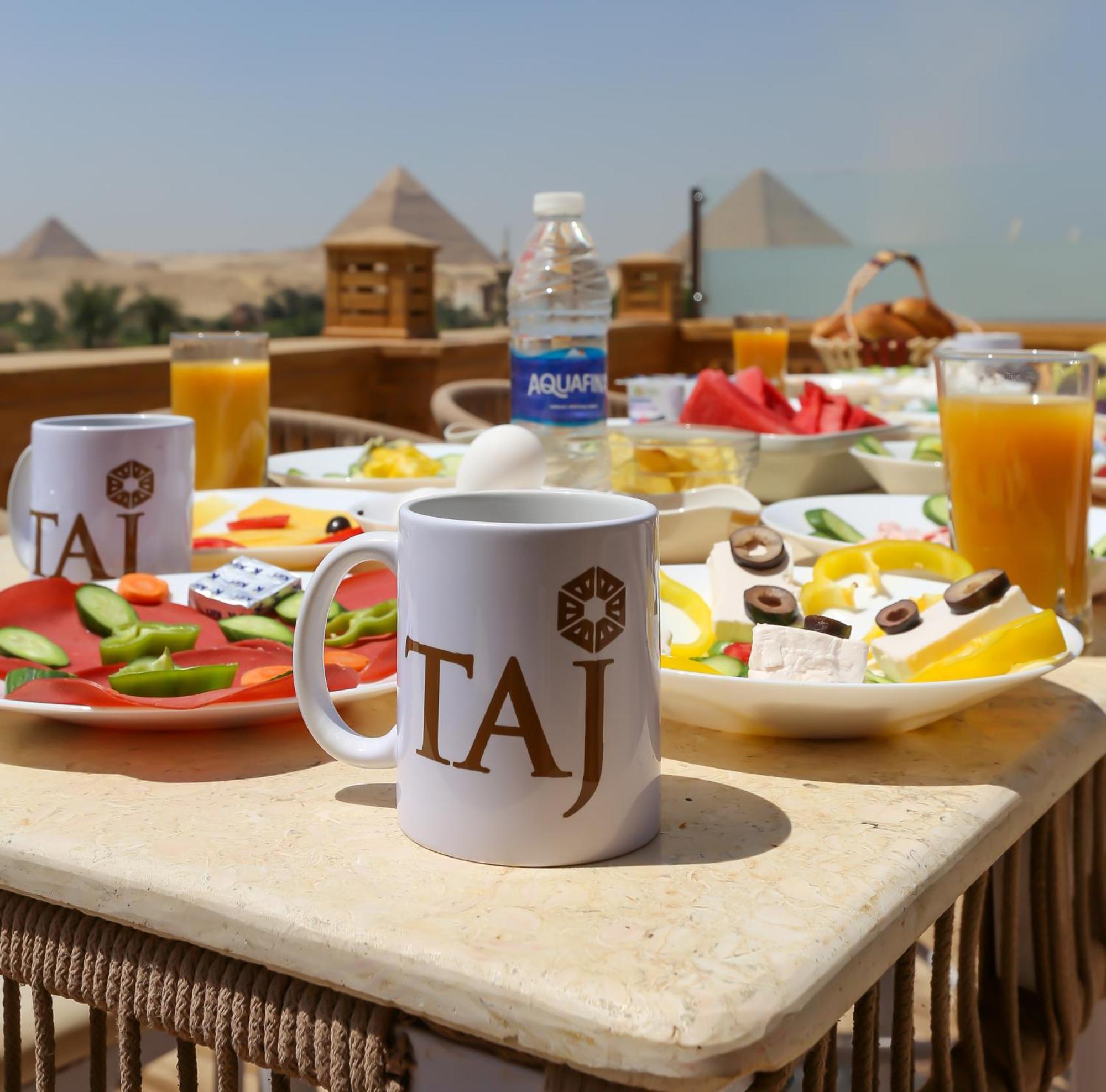 Taj Pyramids View Inn Kafret el-Gabal エクステリア 写真