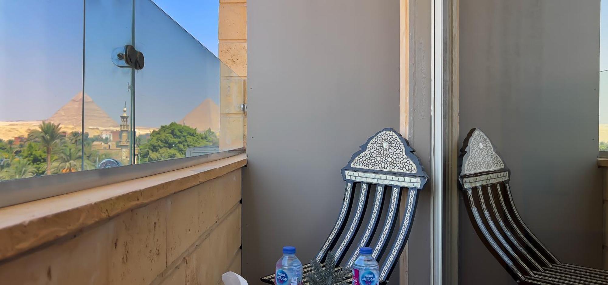 Taj Pyramids View Inn Kafret el-Gabal エクステリア 写真