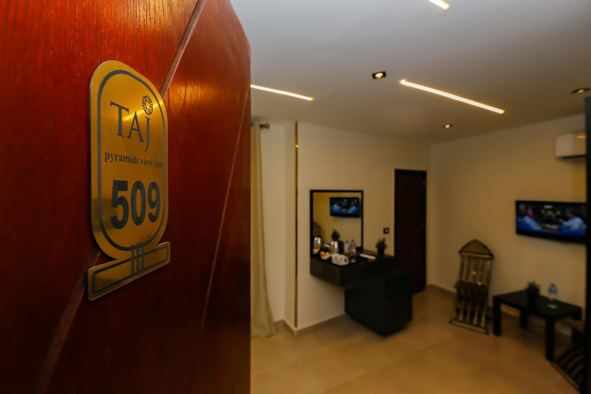 Taj Pyramids View Inn Kafret el-Gabal エクステリア 写真