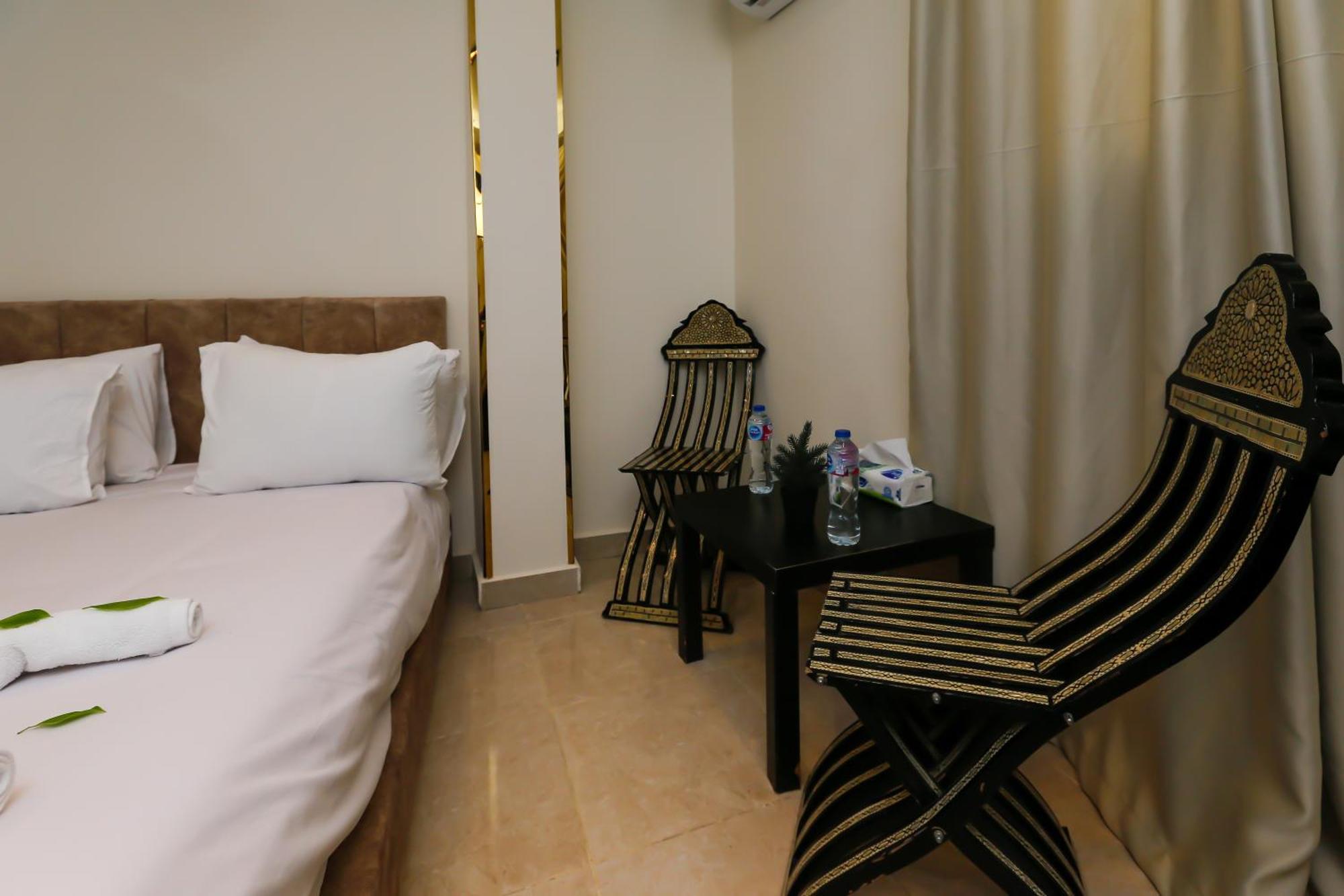 Taj Pyramids View Inn Kafret el-Gabal エクステリア 写真