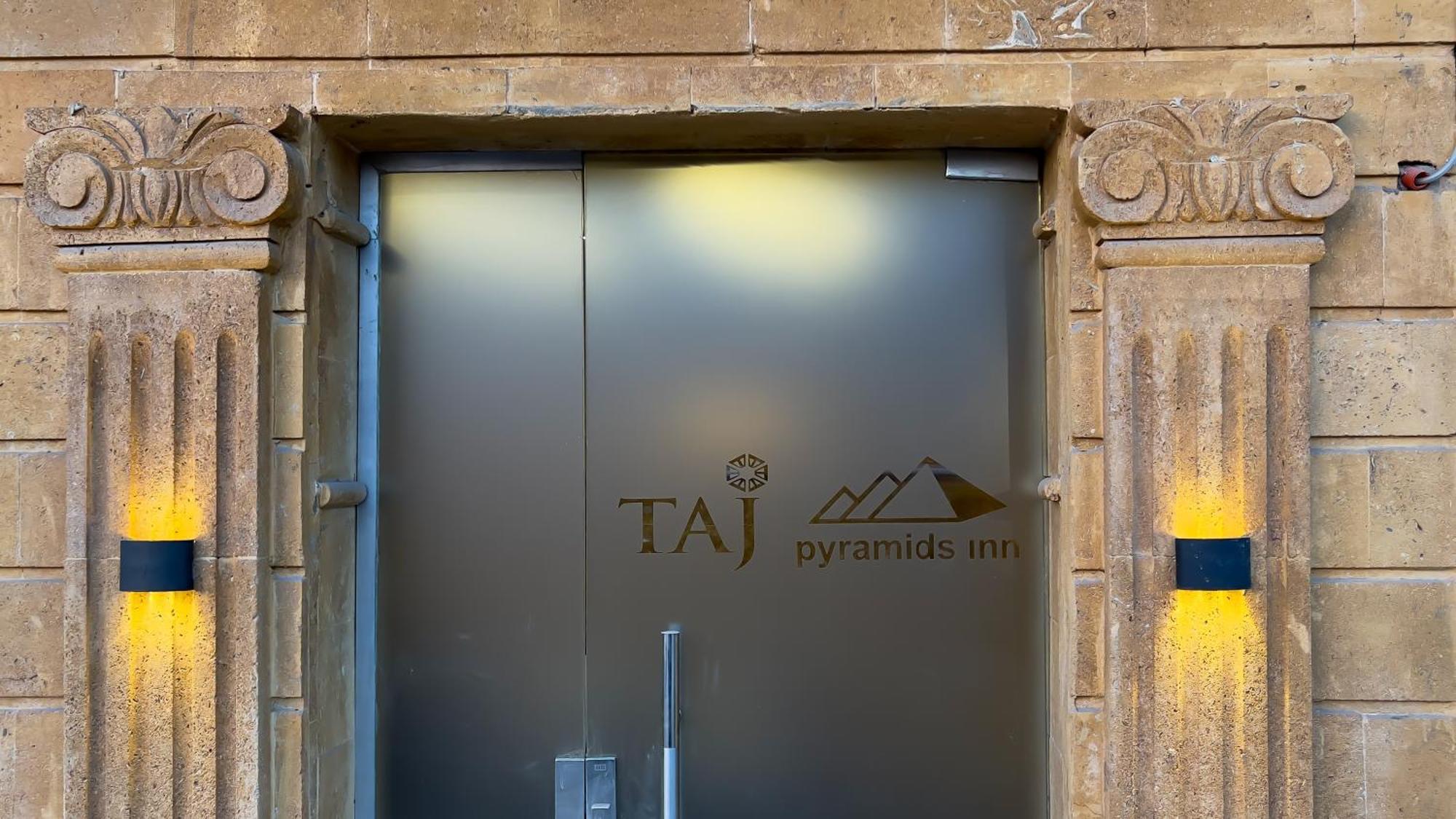 Taj Pyramids View Inn Kafret el-Gabal エクステリア 写真
