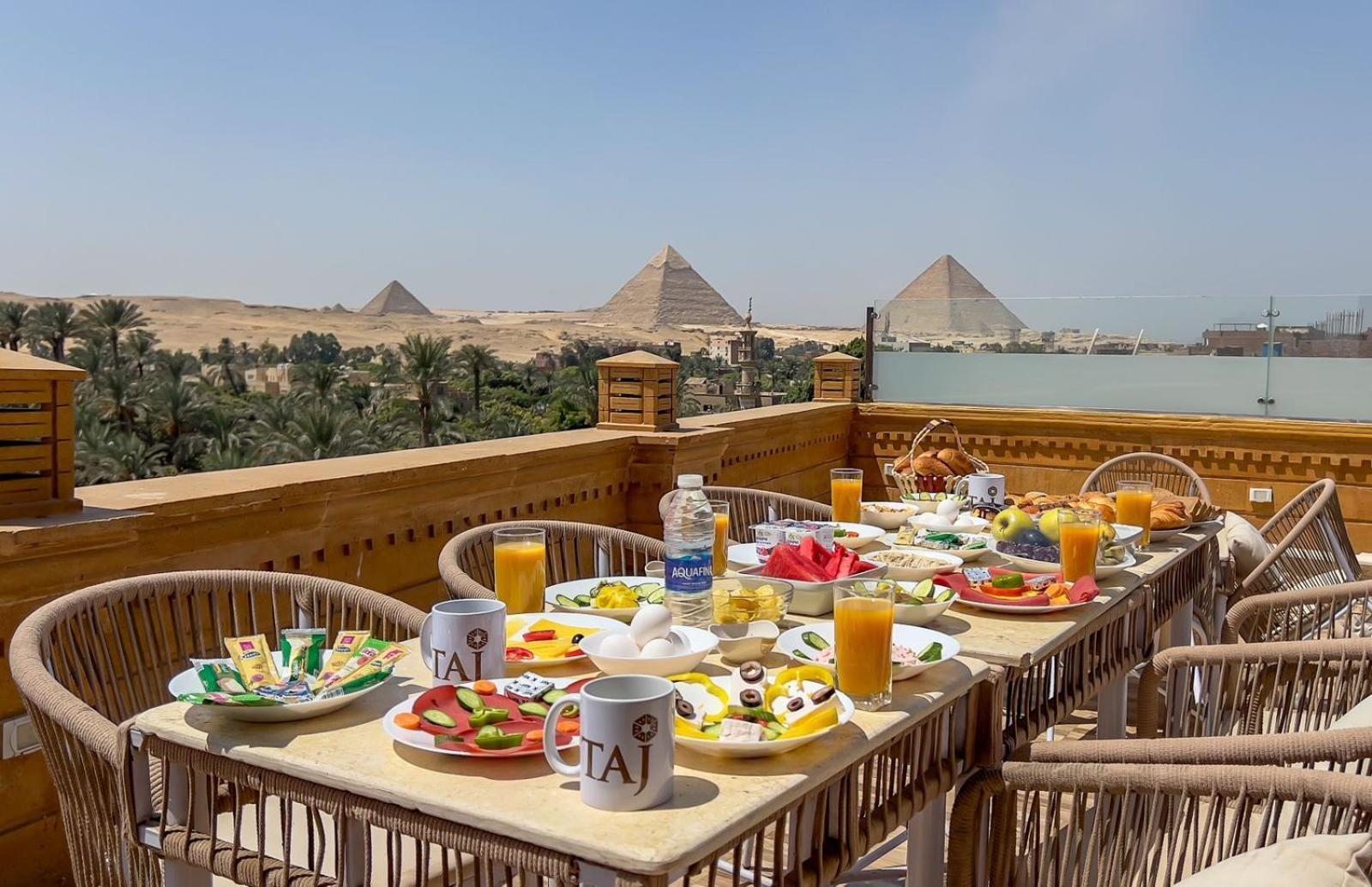 Taj Pyramids View Inn Kafret el-Gabal エクステリア 写真