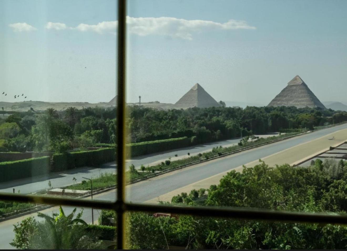 Taj Pyramids View Inn Kafret el-Gabal エクステリア 写真